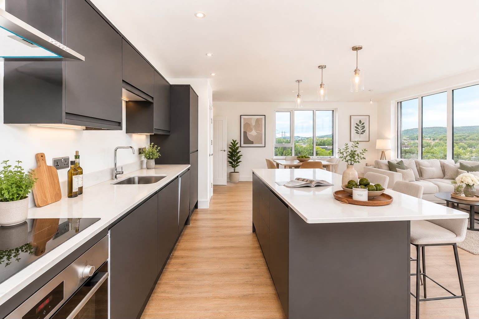 Open-plan kitchen with island and quartz worktops